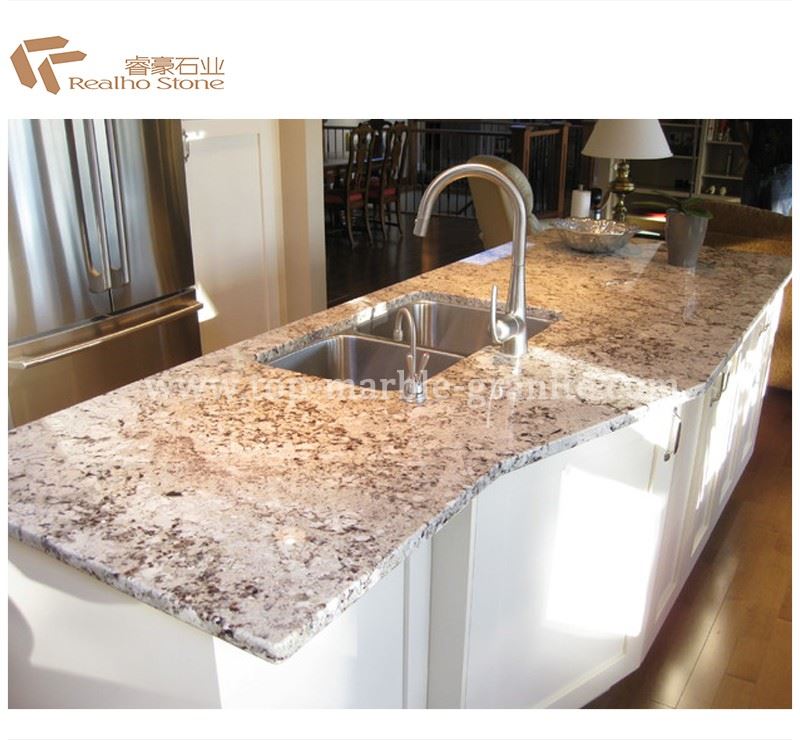 white kitchen island with granite top
