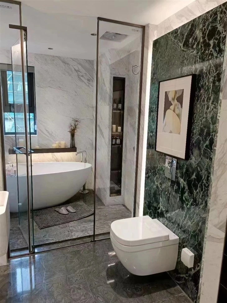 dark green marble tile bathroom